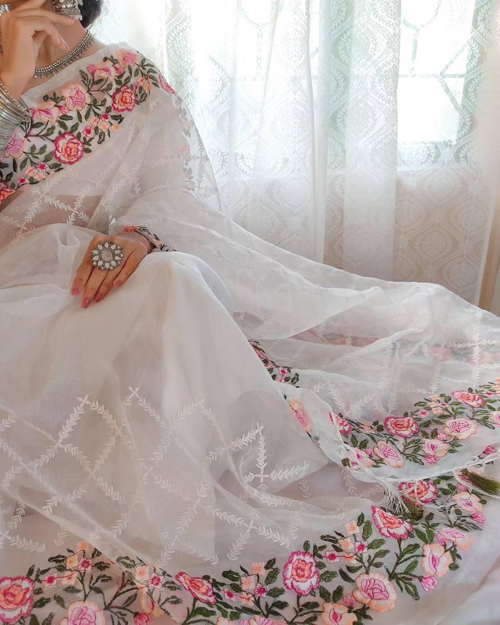 Soft organza saree with flower embroidery with tassels in pallu